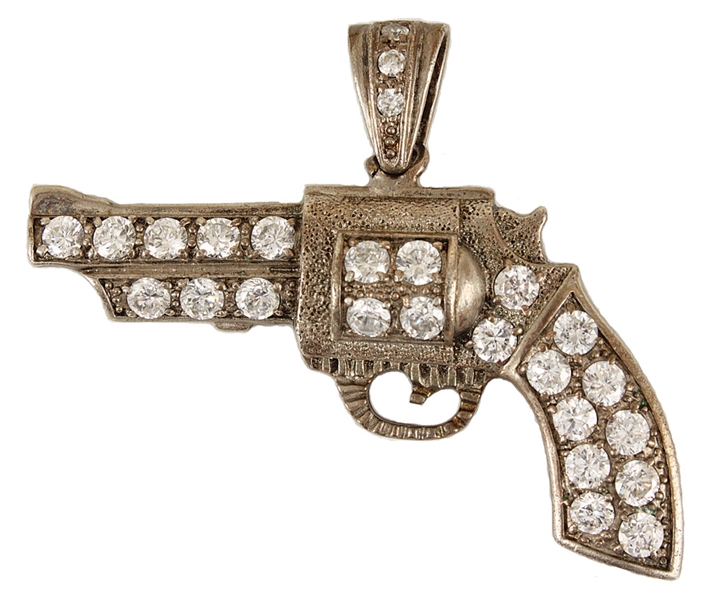Tupac Shakurs Owned and Worn Iconic Silver Gun Charm