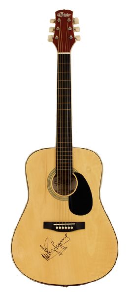 Miley Cyrus Owned and Signed Acoustic Guitar