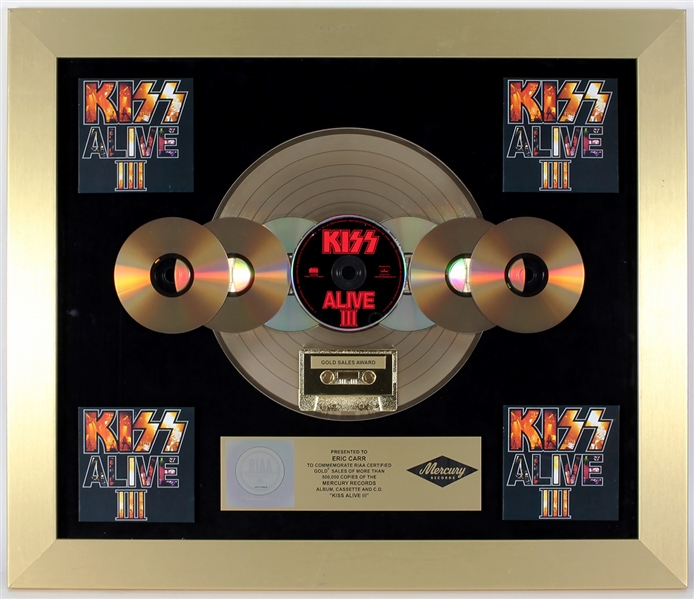 KISS "Alive III" Original RIAA Gold Album, Cassette and C.D. Award Presented to Eric Carr