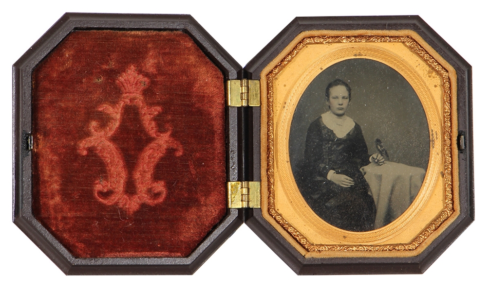 Young Girl Seated with Bird Tintype in Gutta Percha Case