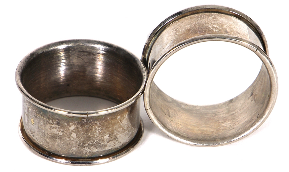 Pair of Elvis Presley Owned and Engraved Silver Napkin Rings From Graceland