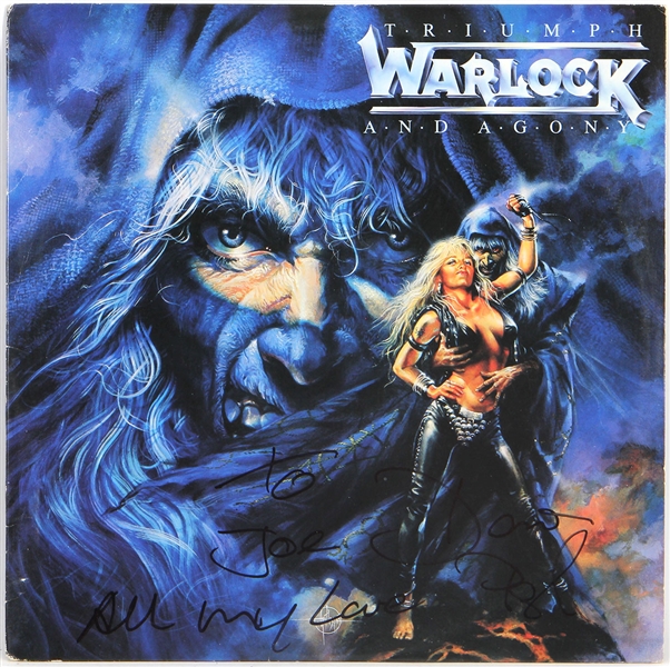 Warlock Signed "Triumph And Agony" Album