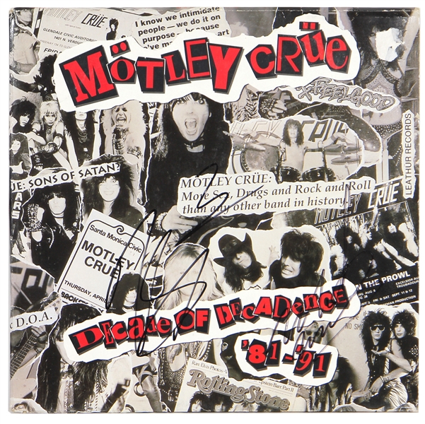 Motley Crüe Lee and Six Signed "Decade of Decadence 81 - 91" Album