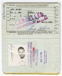 Larry Holmes Twice- Signed Original 1970s Passport and Signed Vaccination Document