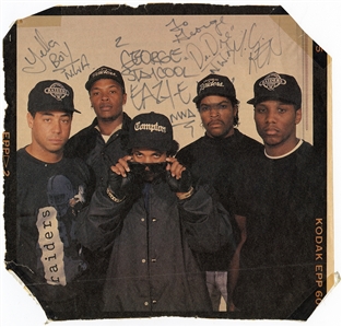 N.W.A. Signed Color Magazine Photograph with Eazy-E and Ice Cube’s Face Crossed Out! (JSA)