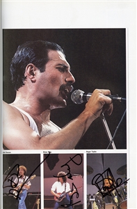 Multi-Signed LIVE AID Concert Book (1985) - Featuring Autographs of Queen, Elton John & More (JSA)