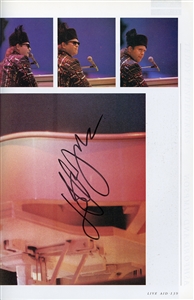 Multi-Signed LIVE AID Concert Book (1985) - Featuring Autographs of Queen, Elton John & More (JSA)