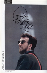 Multi-Signed LIVE AID Concert Book (1985) - Featuring Autographs of Queen, Elton John & More (JSA)