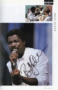Multi-Signed LIVE AID Concert Book (1985) - Featuring Autographs of Queen, Elton John & More (JSA)