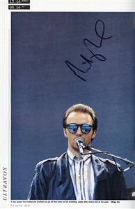 Multi-Signed LIVE AID Concert Book (1985) - Featuring Autographs of Queen, Elton John & More (JSA)