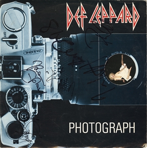 Def Leppard Signed “Photograph" Album With Steve Clark (Beckett)